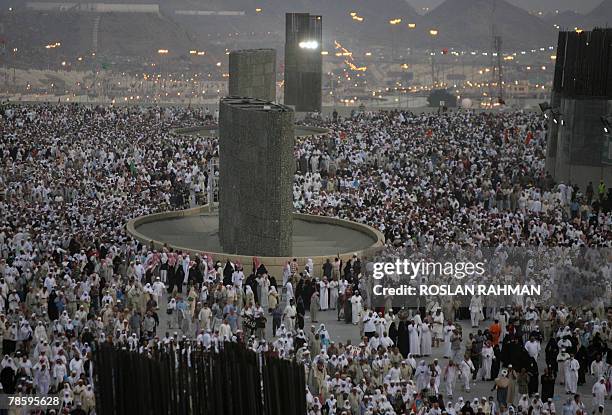 Thousands of Muslim pilgrims arrive for the stoning of walls, in a ritual called "Jamarat," symbolising stoning the devil, in Mina near the Saudi...