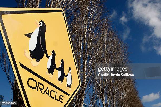 Sign with Linux penguins is seen in front of the Oracle headquarters December 20, 2007 in Redwood Shores, California. Oracle reported a 25 percent...