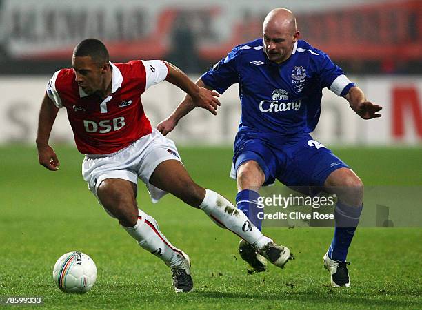 Moussa Dembele of AZ Alkmaar is challenged by Lee Carsley of Everton during the UEFA cup group A match between AZ Alkmaar and Everton at the DSB...