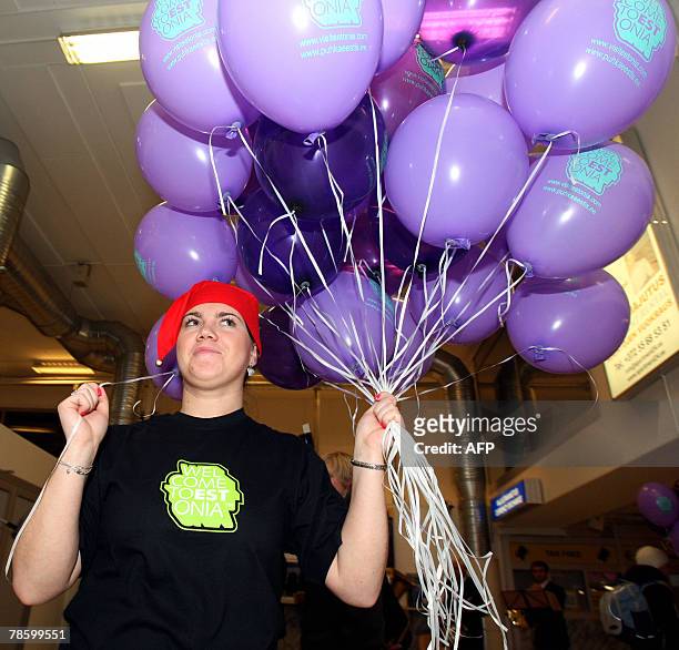Person carries ballons 20 december 2007 at the airport in Tallin during proceedings marking the entry of Esotnia into the Schengen borderless zone....