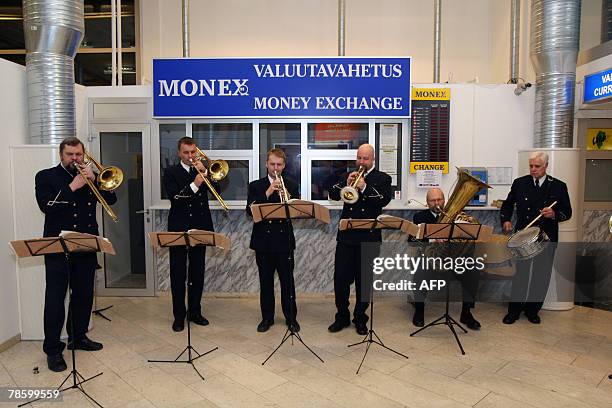 Band plays at a check point 20 december 2007 at the airport in Tallin during proceedings marking the entry of Esotnia into the Schengen borderless...