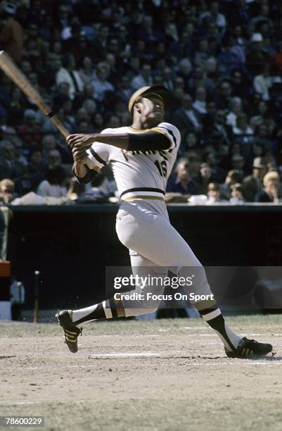 Outfielder Al Oliver of Pittsburgh Pirates swings and watches the flight of his ball during a MLB baseball game circa early 1970s. Oliver played for...