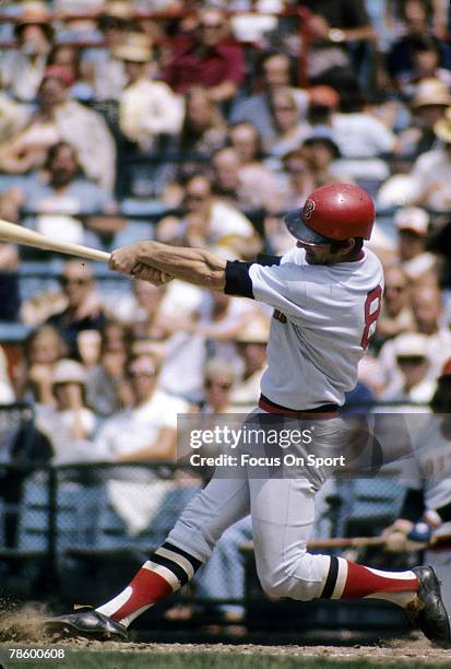 Outfielder Carl Yastrzemski of the Boston Red Sox swings and watches the flight of his ball during a MLB baseball game circa mid 1970s. Yastrzemski...