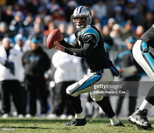 Matt Moore of the Carolina Panthers looks to pass against the Seattle Seahawks during the second half at Bank of America Stadium on December 16, 2007...