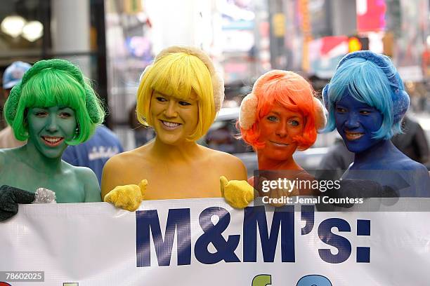 Members of the organization "People for the Ethical Treatment of Animals" also known as PETA stage a "nude" protest in front of the M&M's World...