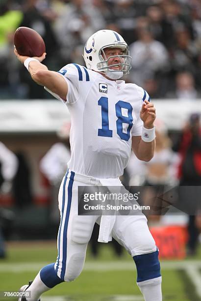 Peyton Manning of the Indianapolis Colts attempts to pass the ball against the Oakland Raiders on December 16, 2007 at McAfee Coliseum in Oakland,...