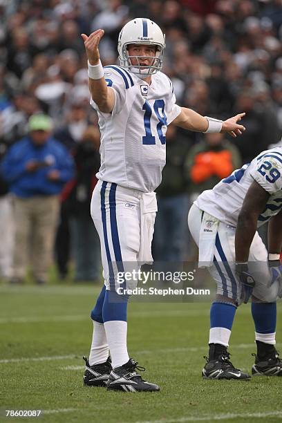Peyton Manning of the Indianapolis Colts calls an audible against the Oakland Raiders on December 16, 2007 at McAfee Coliseum in Oakland, California....