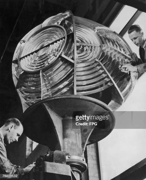 Two-ton ten-foot optical apparatus built for the Ytteroerne Lighthouse in Norway on display at the British Industries Fair in London's Olympia, circa...