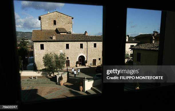 Picture taken 14 December 2007 of a medieval castle restaured by Italian luxury designer Brunello Cucinelli in the medieval hilltop village of...