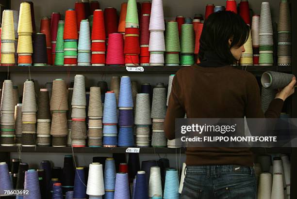 Picture taken 14 December 2007 of assortment of cachemere spools in Italian luxury designer Brunello Cucinelli factory in the medieval hilltop...