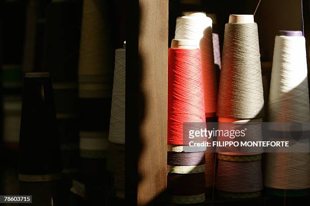 Picture taken 14 December 2007 of assortment of cachemere spools in Italian luxury designer Brunello Cucinelli factory in the medieval hilltop...