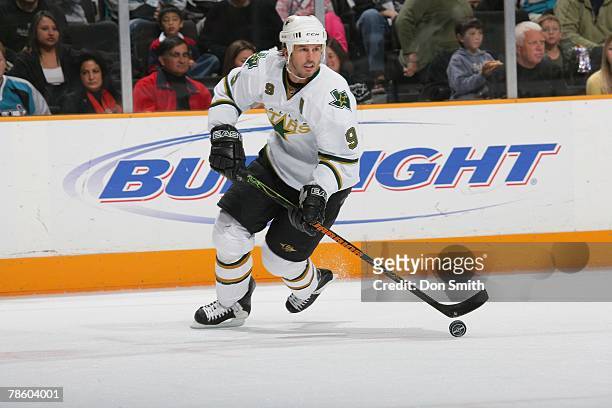 Mike Modano of the Dallas Stars skates with the puck on the ice during an NHL game against the San Jose Sharks on December 15, 2007 at HP Pavilion at...