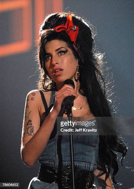 Singer Amy Winehouse performs "Back to Black" on stage during the 2007 MTV Europe Music Awards held at the Olympiahalle on November 1, 2007 in...
