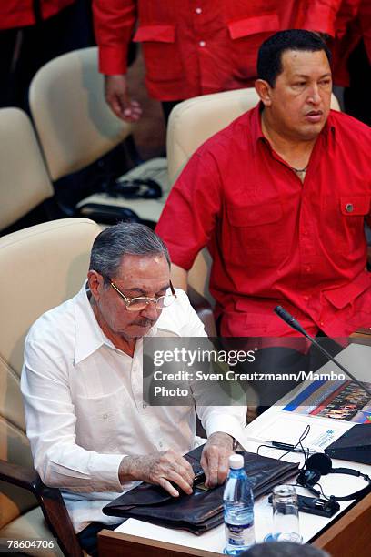 Acting President of Cuba Raul Castro and President of Venezuela Hugo Chavez attend the opening session of the 4th PetroCaribe Summit at the Jagua...