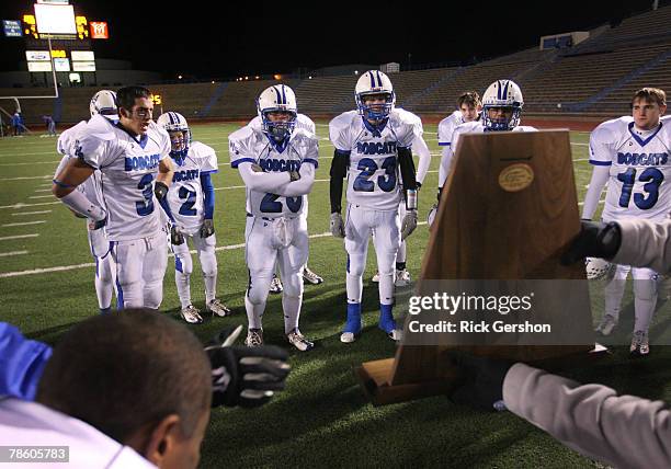 The Rule Bobcats look at the the runner up trophy after losing the Division I six-man football state championship to the Richland Springs Coyotes on...