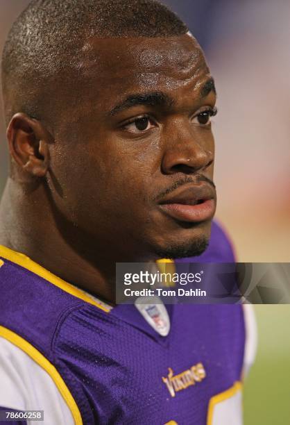 Adrian Peterson of the Minnesota Vikings warms up prior to an NFL game against the Chicago Bears at the Hubert H. Humphrey Metrodome, December 17,...