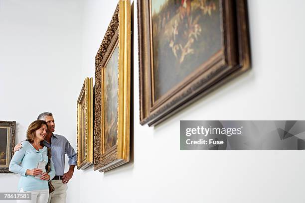 couple at art gallery - art show stock pictures, royalty-free photos & images