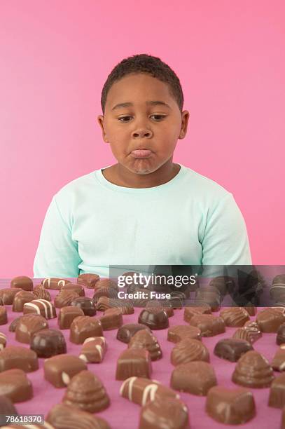115 Fat Kid Eating Chocolate Stock Photos High Res Pictures And 115-fat-kid-eating-chocolate-stock-photos-high-res-pictures-and