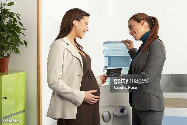 water cooler conversation - ultra sonography stock pictures, royalty-free photos & images