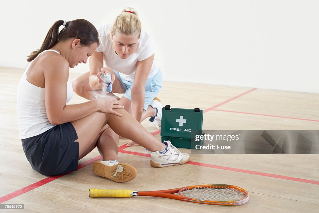 Treating Sports Injury on Squash Court