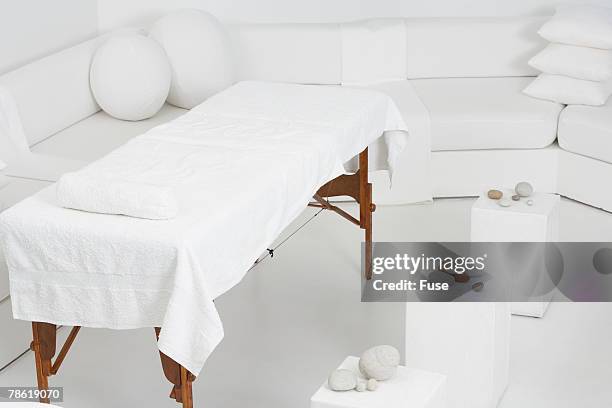 massage table - massage table no people stock pictures, royalty-free photos & images