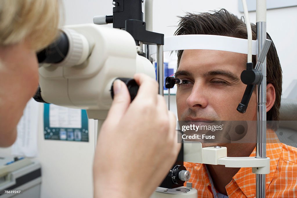 Optometrist Examining Patient
