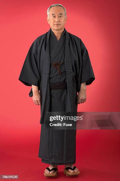 Japanese Robe Man Wearing A Kimono (Japanese Robe) Photos and Premium High Res Pictures ...