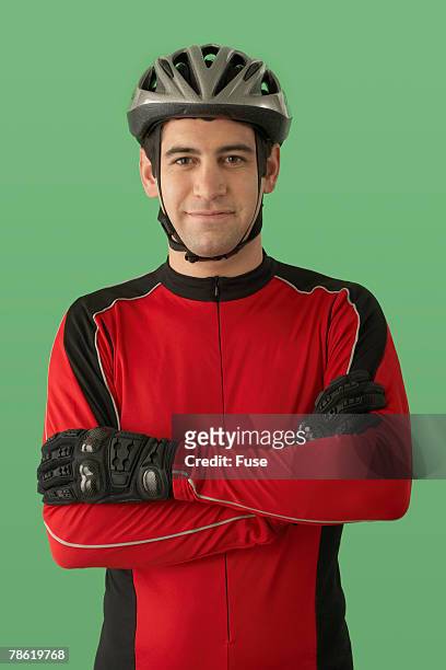 cyclist wearing protective clothing - sporttrikot freisteller stock-fotos und bilder