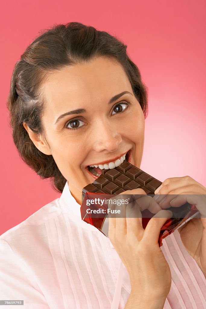 Woman Eating Chocolate