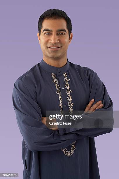 man wearing embroidered shirt - chinese collar stock pictures, royalty-free photos & images