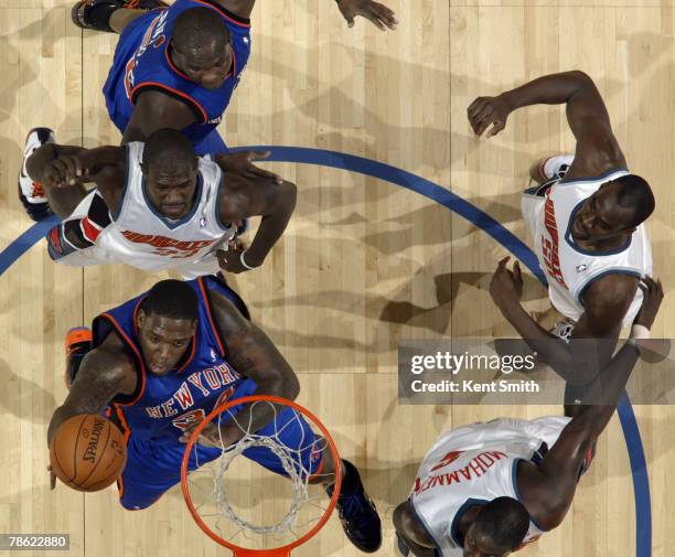 Eddy Curry of the New York Knicks shoots against the Charlotte Bobcats at the Charlotte Bobcats Arena December 21, 2007 in Charlotte, North Carolina....