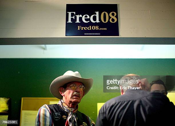 Supporters wait to greet Republican presidential candidate Fred Thompson at a campaign event at the Webster County Republican headquarters December...