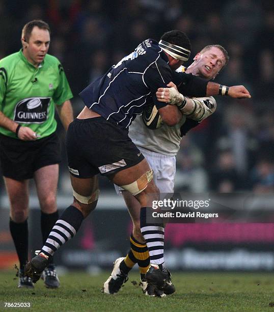 Andrew Blowers of Bristol is tackled by Tom Rees during the Guinness Premiership match between Bristol and London Wasps at the Memorial Ground on...