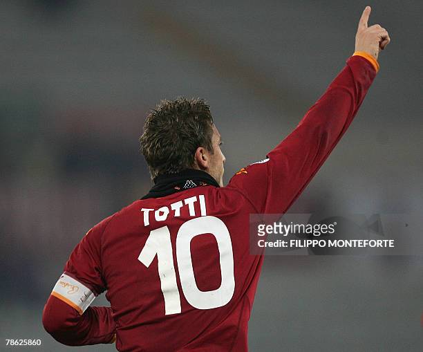 Roma's forward and captain Francesco Totti jubilates after scoring a penalty kick against Sampdoria during their Serie A football match in Rome's...