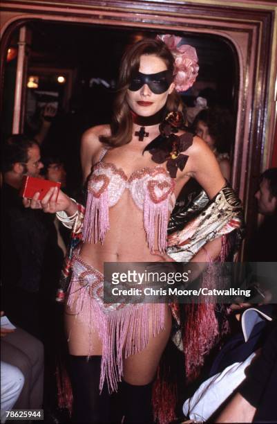 Carla Bruni wearing a creation from Jean Paul Gaultier's Fringe Bikini Spring 97 collection in 1997 in Paris.