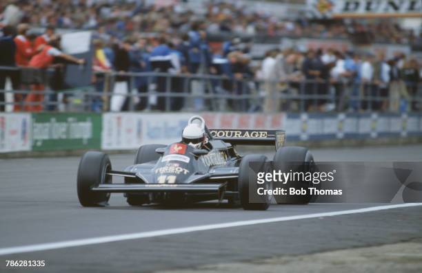 Italian racing driver Elio de Angelis drives the John Player Team Lotus Lotus 87 Cosworth V8 in the 1981 British Grand Prix at Silverstone Circuit in...