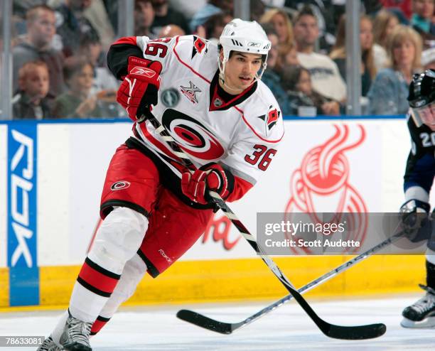 Brandon Nolan of the Carolina Hurricanes passes the puck against the Tampa Bay Lightning at St. Pete Times Forum on December 22, 2007 in Tampa,...