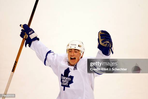 Tomas Kaberle of the Toronto Maple Leafs celebrates their 2-1 overtime win against the Florida Panthers at the Bank Atlantic Center on December 22,...