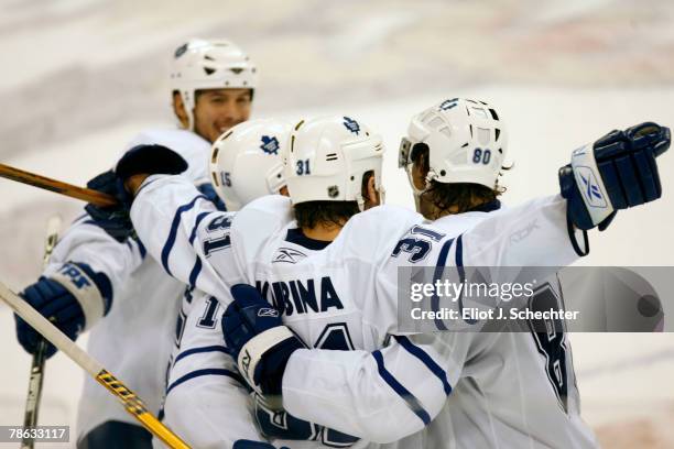 Pavel Kubina of the Toronto Maple Leafs celebrates his overtime winning goal with teammates against the Florida Panthers at the Bank Atlantic Center...