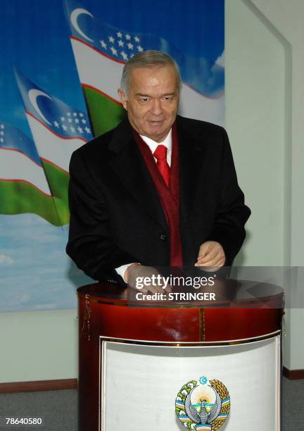 Uzbek President Islam Karimov casts his ballot at a polling station in Tashkent, 23 December 2007. Uzbekistan voted Sunday in an election where...