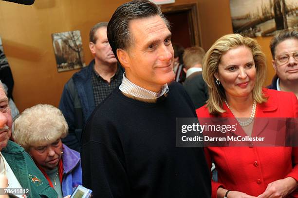 Republican presidential candidate and former Massachusetts Gov. Mitt Romney and wife Ann speak with diners at Nonni's Italian Eatery December 23,...