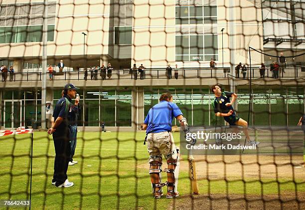 Kangaroo footballer Brent Harvey and Australian captain Ricky Ponting watch Shaun Tait bowl during an Australian nets session at the Melbourne...