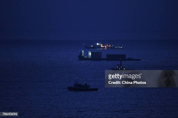Barge carrying the wreck of the 800-year-old sunken merchant ship "Nanhai No.1" , sails on the South China Sea on December 24, 2007 in Yangjiang of...