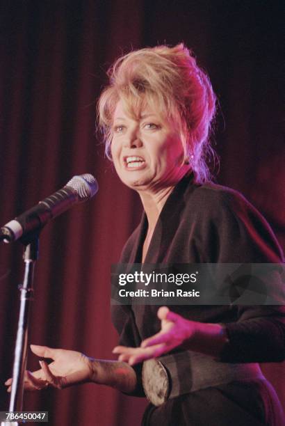 English singer Elaine Paige performs live on stage at The Savoy in London in November 1994.