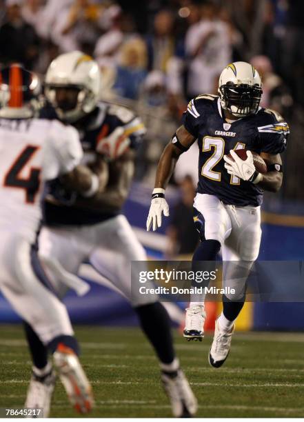 Runningback LaDainian Tomlinson of the San Diego Chargers runs during the first half of their NFL game against the Denver Broncos at Qualcomm Stadium...