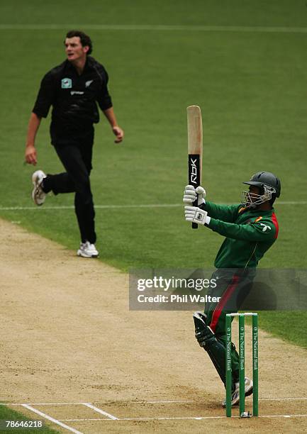 Mark Gillespie of New Zealand celebrates his dismissal of Aftab Ahmed of Bangladesh caught by Peter Fulton during the first one day international...