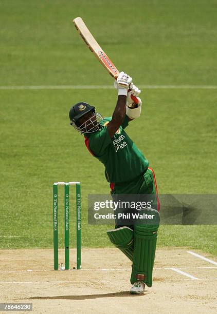 Aftab Ahmed of Bangladesh plays a shot during the first one day international match between the New Zealand Black Caps and Bangladesh at Eden Park on...