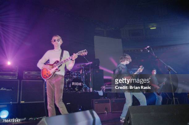 English rock group Ride perform live on stage at the Royal Albert Hall in London on 21st September 1994. The band are, from left to right, guitarist...