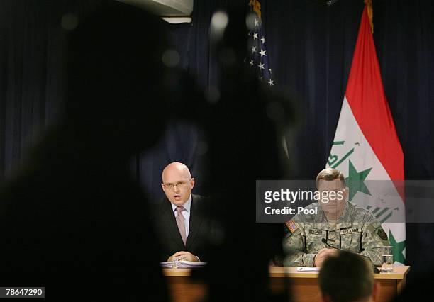Army Maj. Gen. Kevin Bergner , spokesman for Multinational Force-Iraq, and Phil Reeker , U.S. Embassy spokesman, speak to reporters in the heavily...