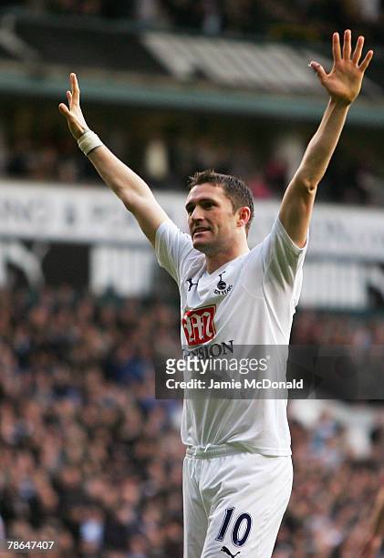 Robbie Keane of Tottenham Hotspur celebrates scoring his sides third goal during the Barclays Premier League match between Tottenham Hotspur and...